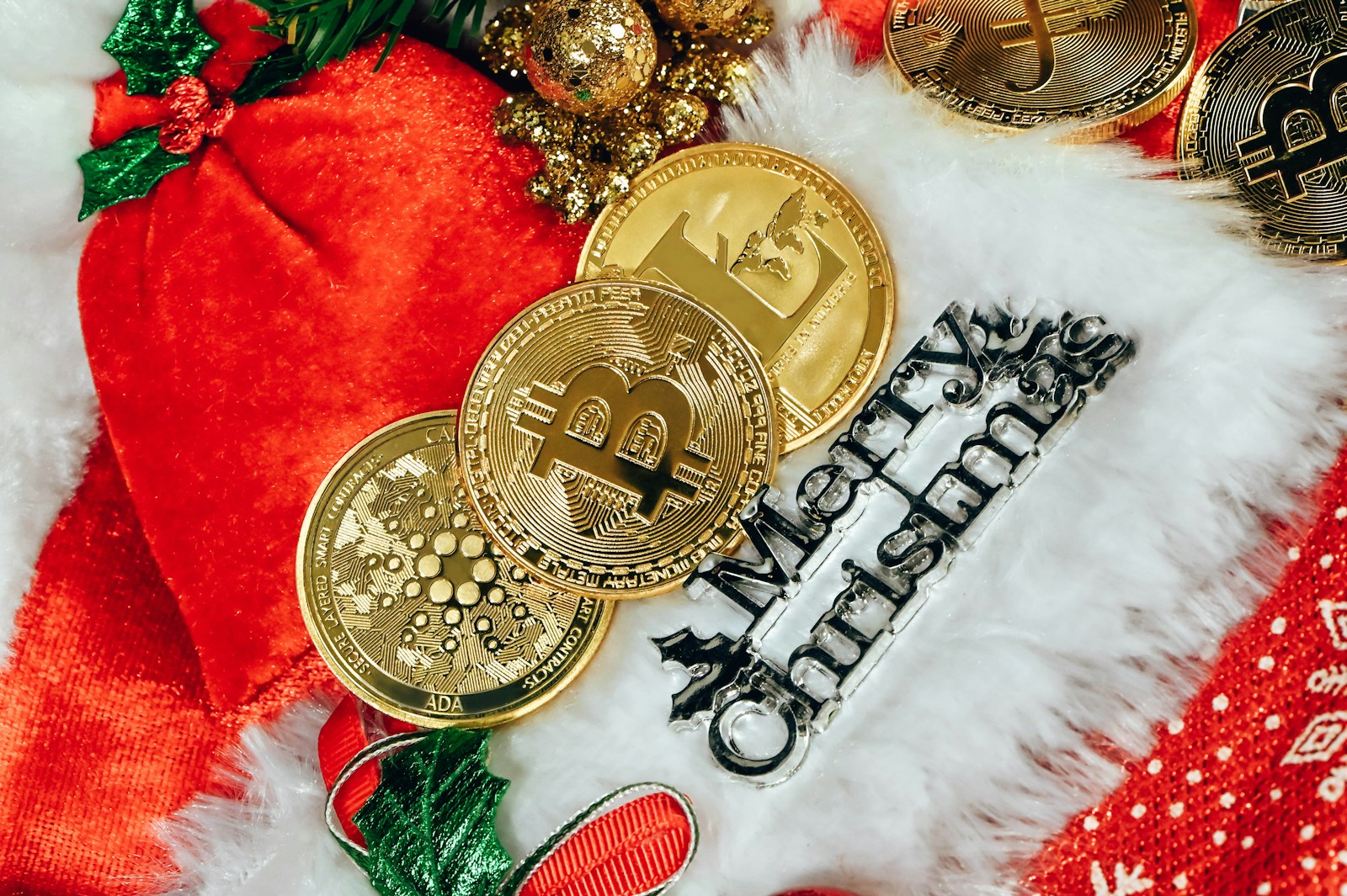 Photo by Traxer a pile of bitcoins sitting on top of a pile of christmas decorations